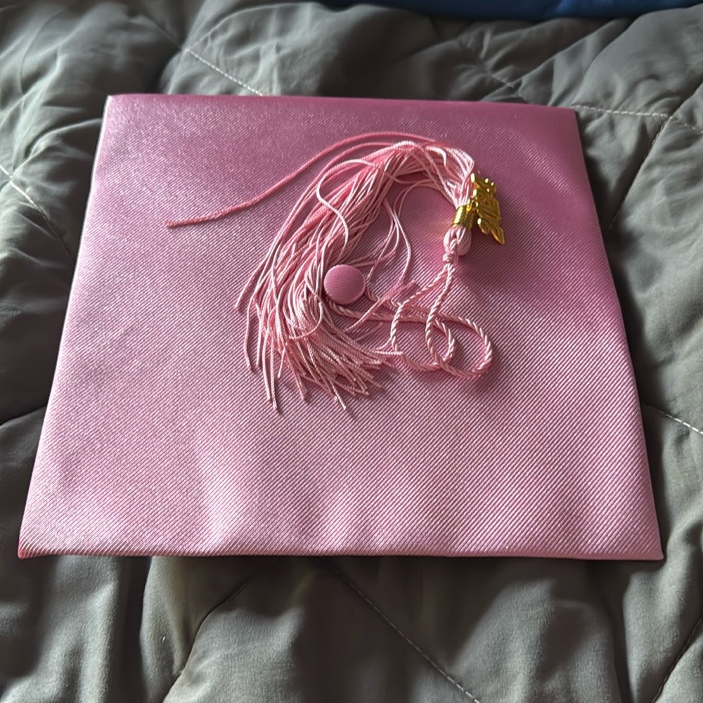 Pink cap and gown size S. Used once. Accepting offers